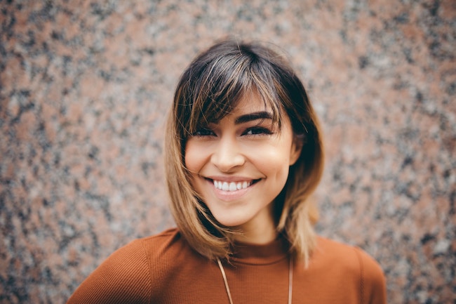 a woman with light brown hair